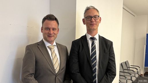 Das Foto zeigt Thomas Liebel, Vertreter für die Bundesbeamtengewerkschaften (links), und Dr. Michael Baum vom BMI.